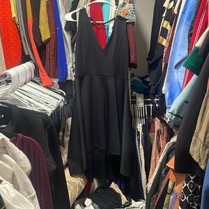 Revamped hi low black dress cut back
